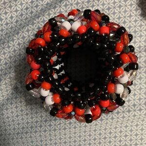 Red, black, white Kandi cuff